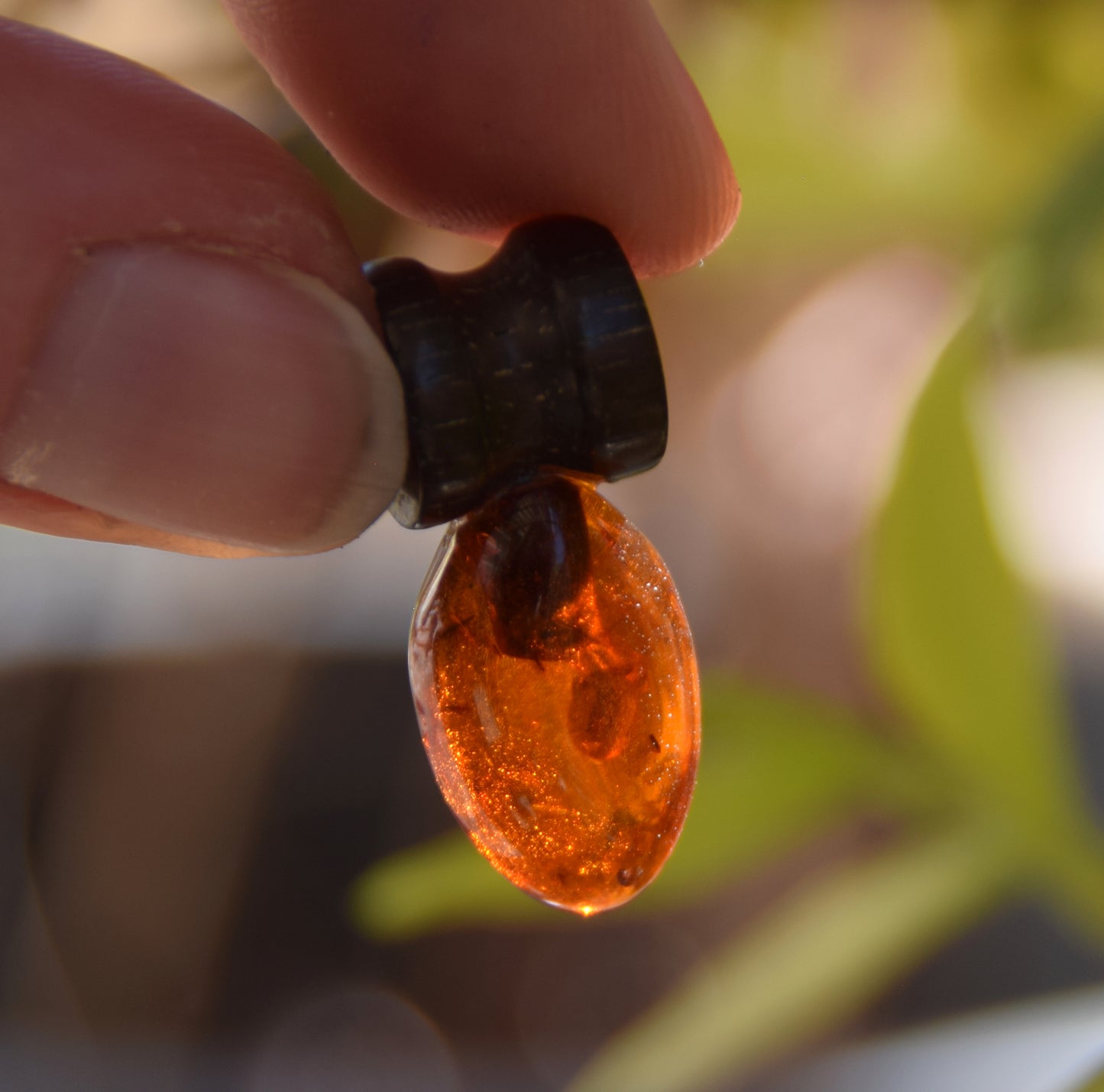 Lightweight oval pendant in natural cognac-colored Amber and mahogany wood, MJ Baltica, BW210