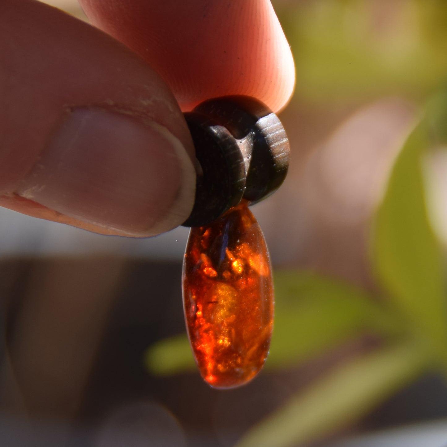Lightweight oval pendant in natural cognac-colored Amber and mahogany wood, MJ Baltica, BW210