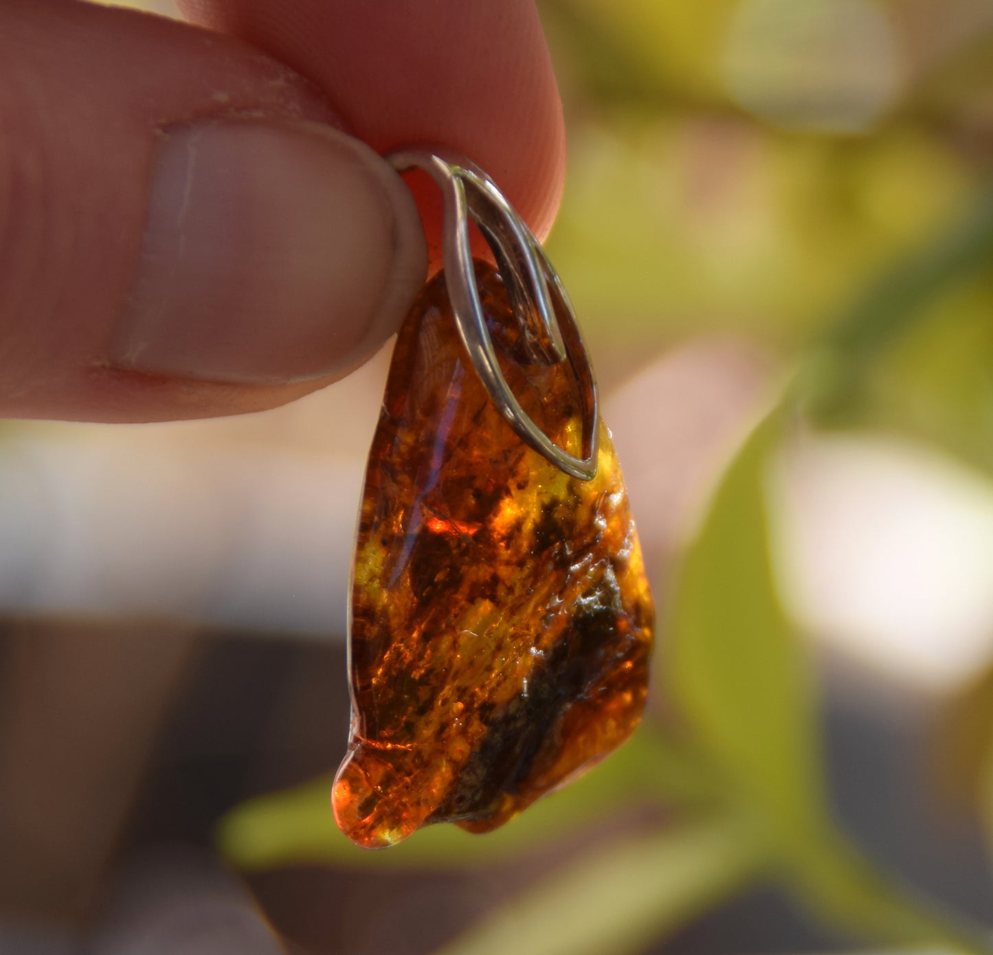 Cognac transparent natural amber pendant with interesting inclusions and 925 Sterling Silver, MJ Baltica, BW225