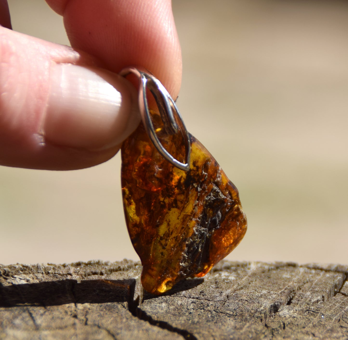 Cognac transparent natural amber pendant with interesting inclusions and 925 Sterling Silver, MJ Baltica, BW225