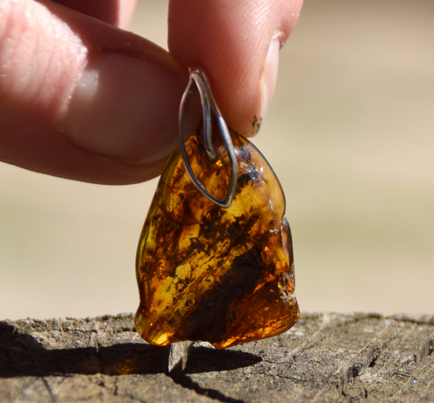 Cognac transparent natural amber pendant with interesting inclusions and 925 Sterling Silver, MJ Baltica, BW225