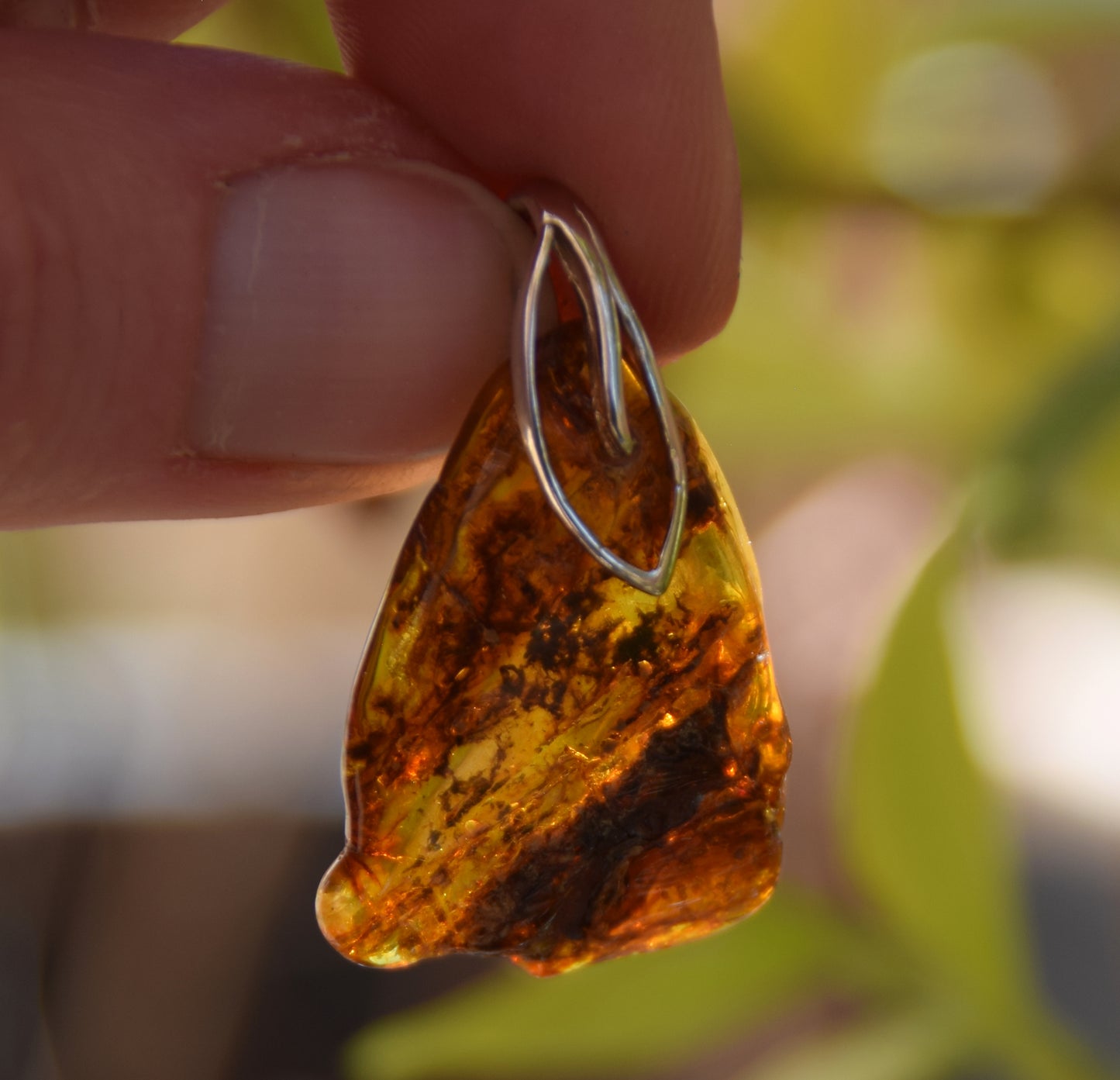 Cognac transparent natural amber pendant with interesting inclusions and 925 Sterling Silver, MJ Baltica, BW225