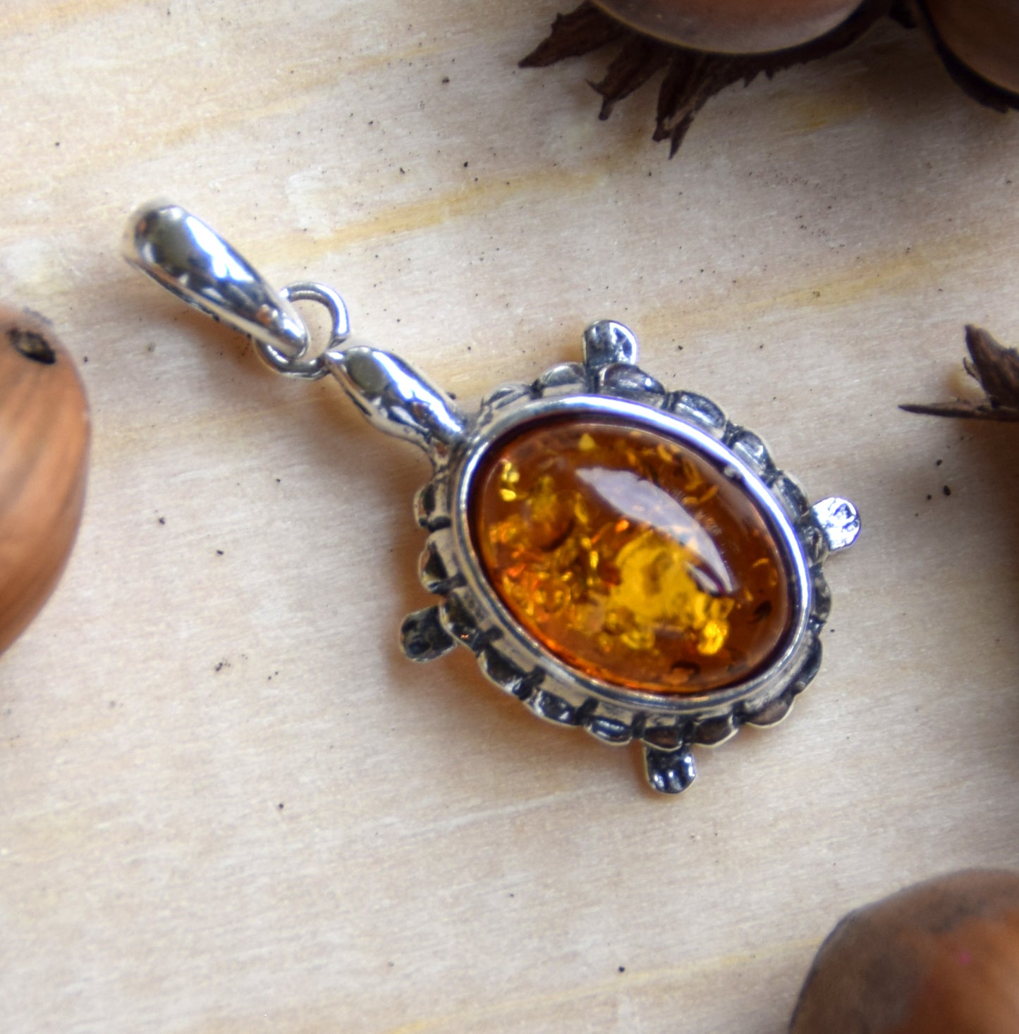 Bright pendant with a turtle in natural cognac brown Amber and 925 Silver, MJ Baltica, BW238