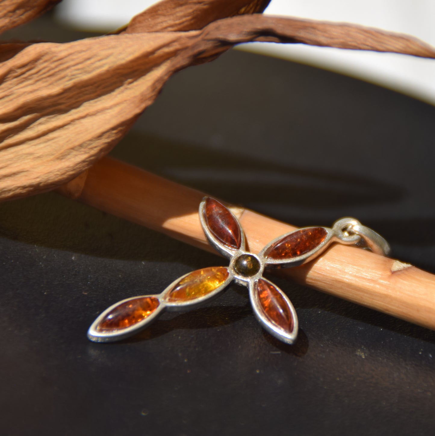 Delicate cross-shaped pendant in natural Amber of various shades and 925 Silver, MJ Baltica, BW259