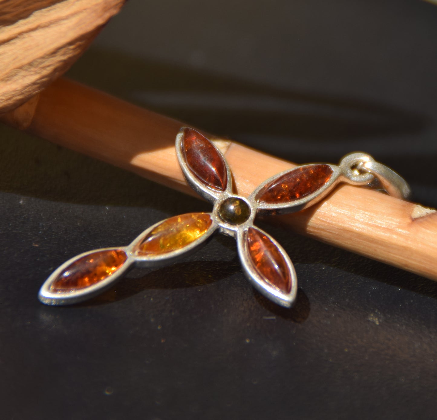 Delicate cross-shaped pendant in natural Amber of various shades and 925 Silver, MJ Baltica, BW259