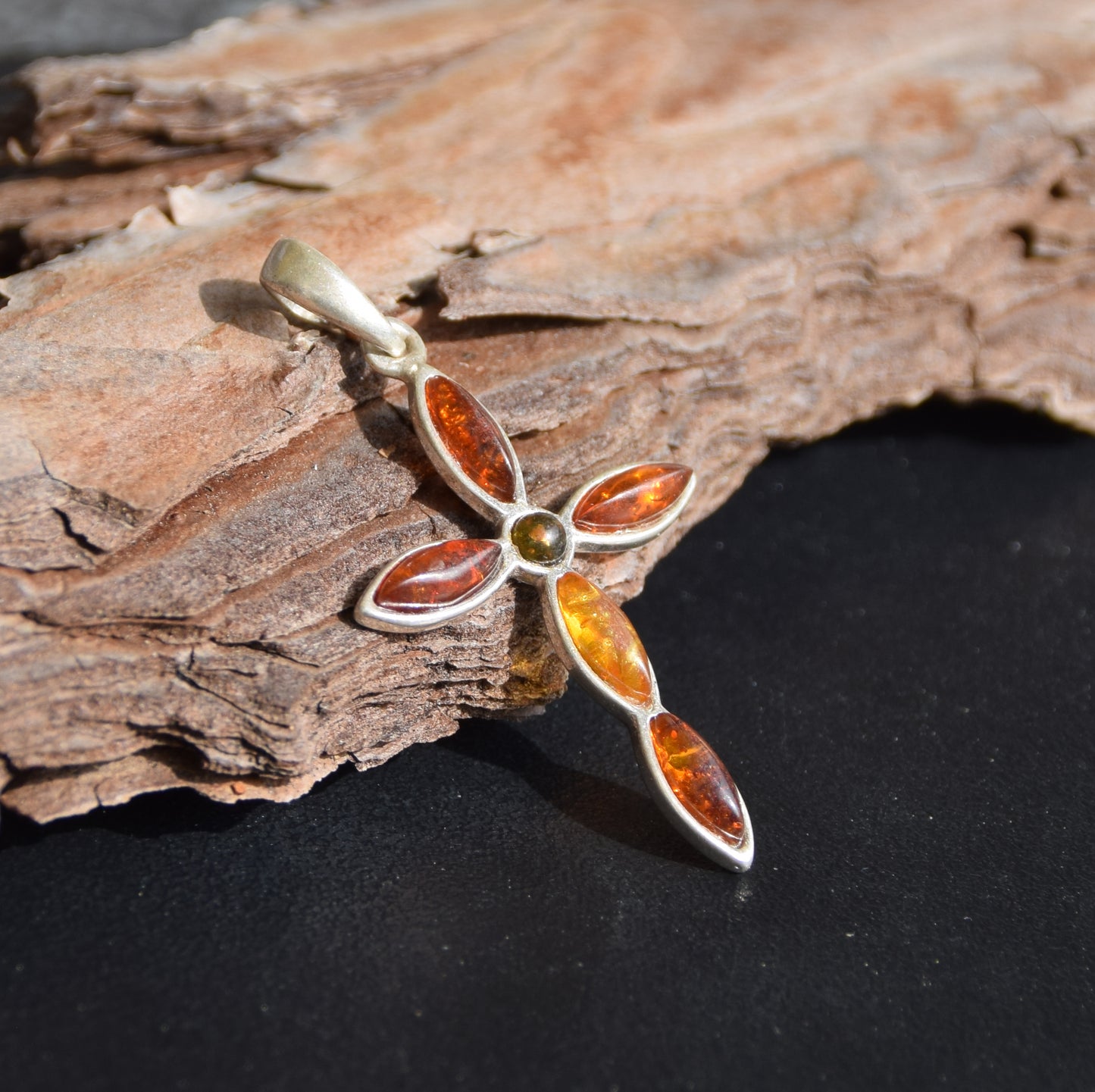 Delicate cross-shaped pendant in natural Amber of various shades and 925 Silver, MJ Baltica, BW259