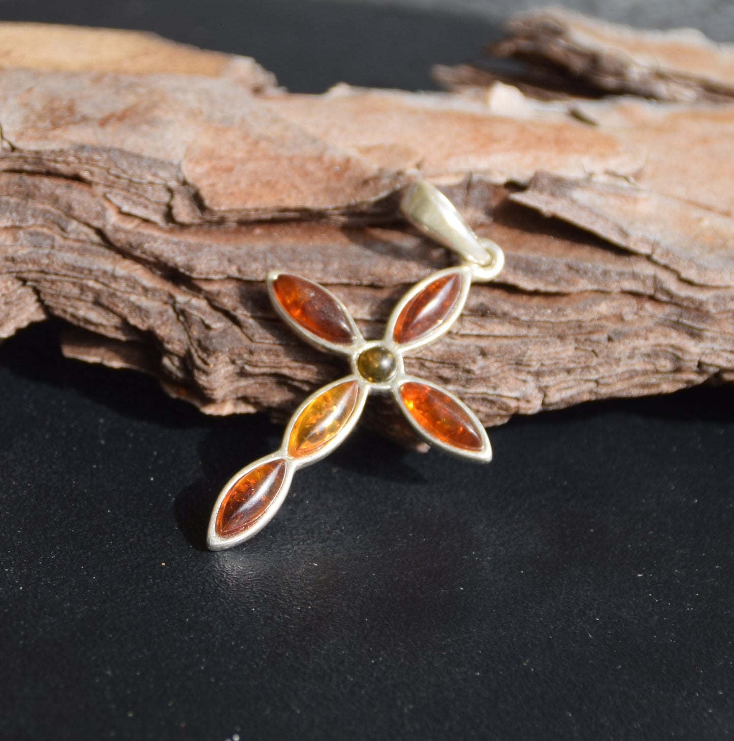 Delicate cross-shaped pendant in natural Amber of various shades and 925 Silver, MJ Baltica, BW259