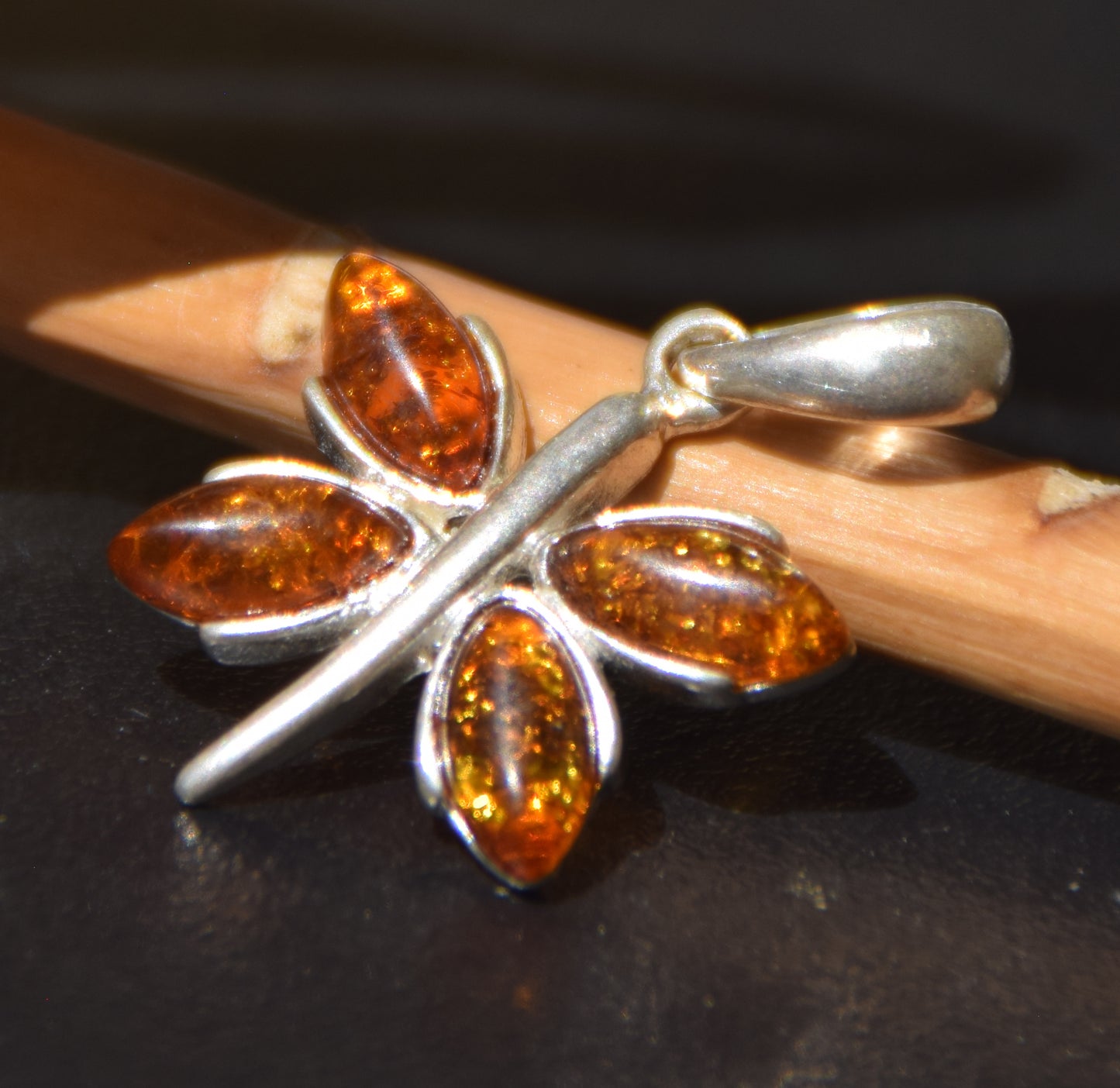 Lightweight pendant with a butterfly in natural cognac-colored Amber and 925 Silver, MJ Baltica, BW260