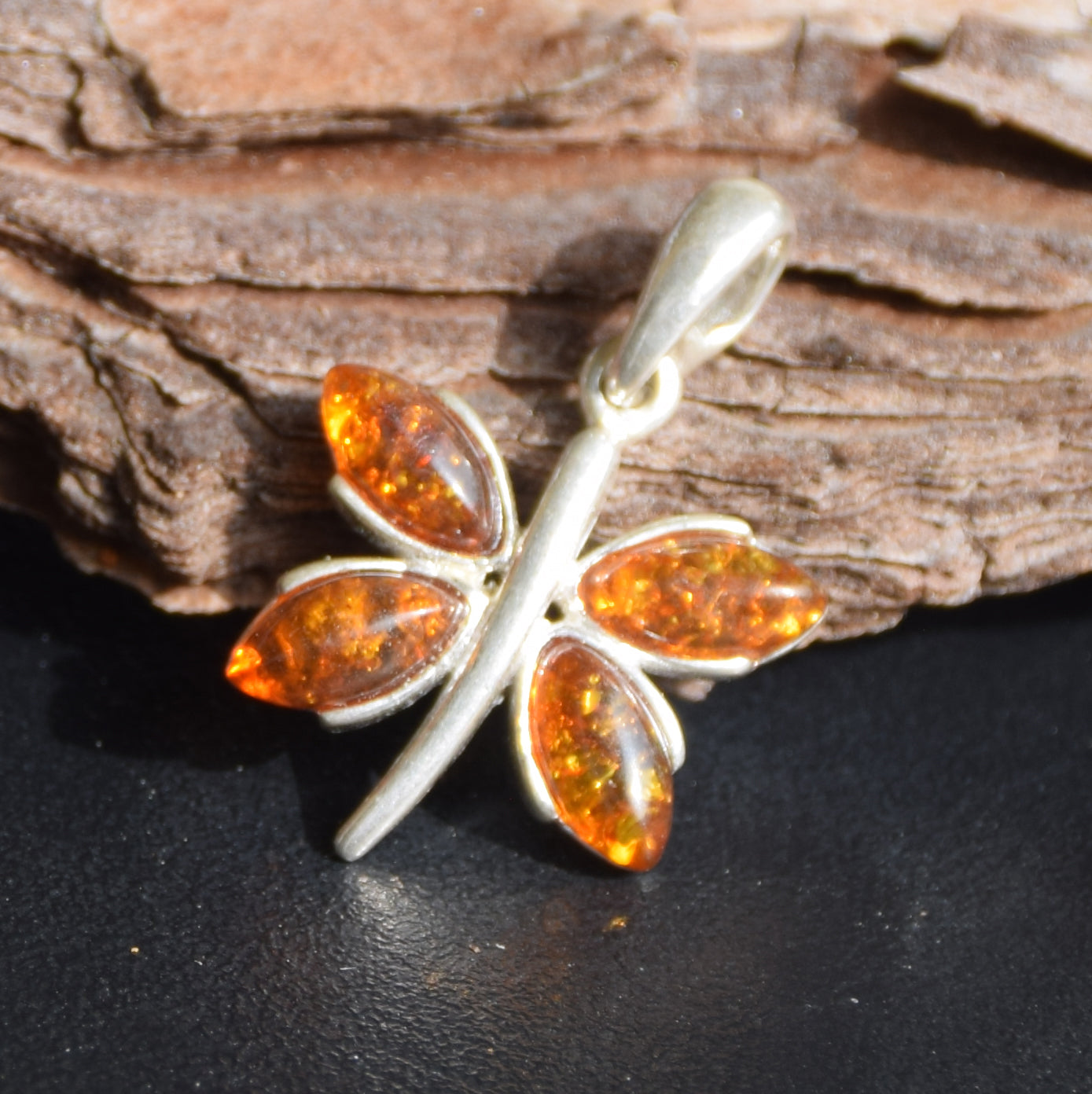 Lightweight pendant with a butterfly in natural cognac-colored Amber and 925 Silver, MJ Baltica, BW260