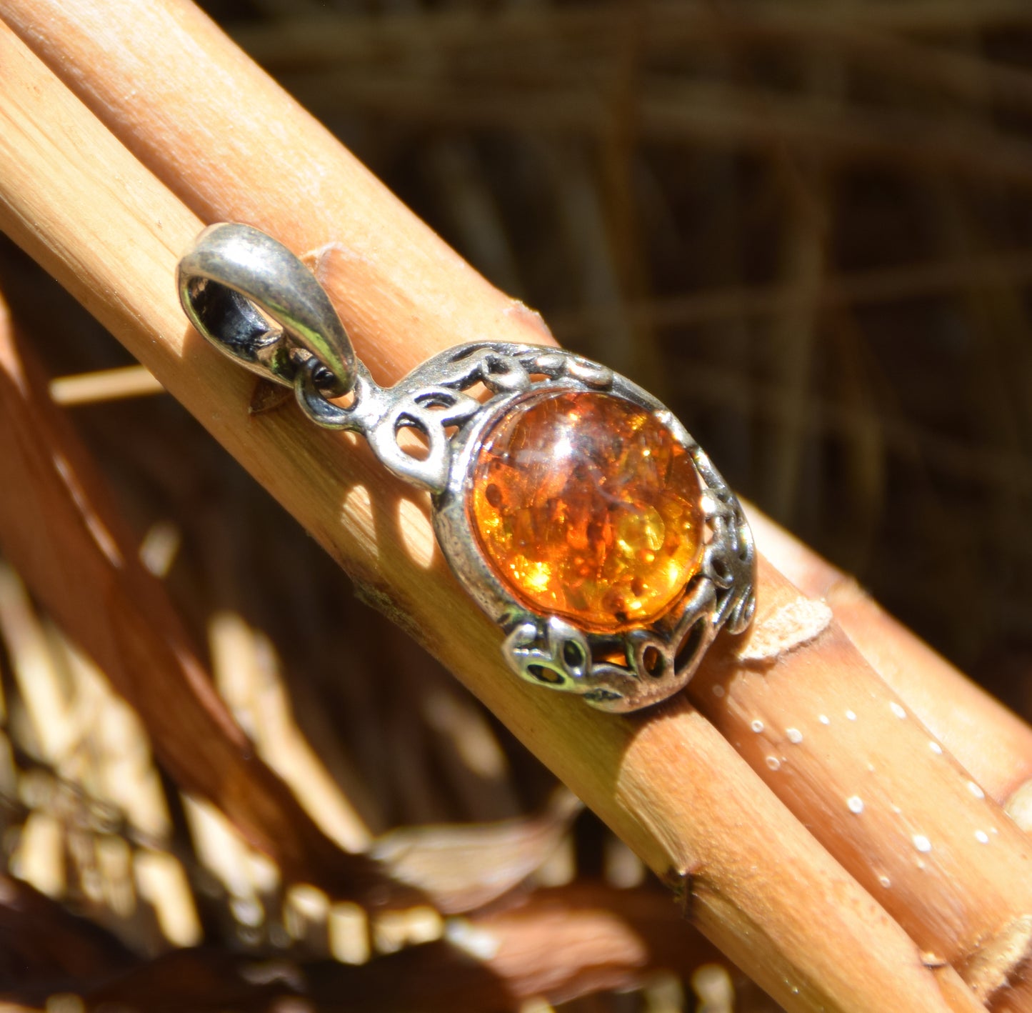Elegant round pendant with natural cognac amber and 925 sterling silver, MJ Baltica, BW261