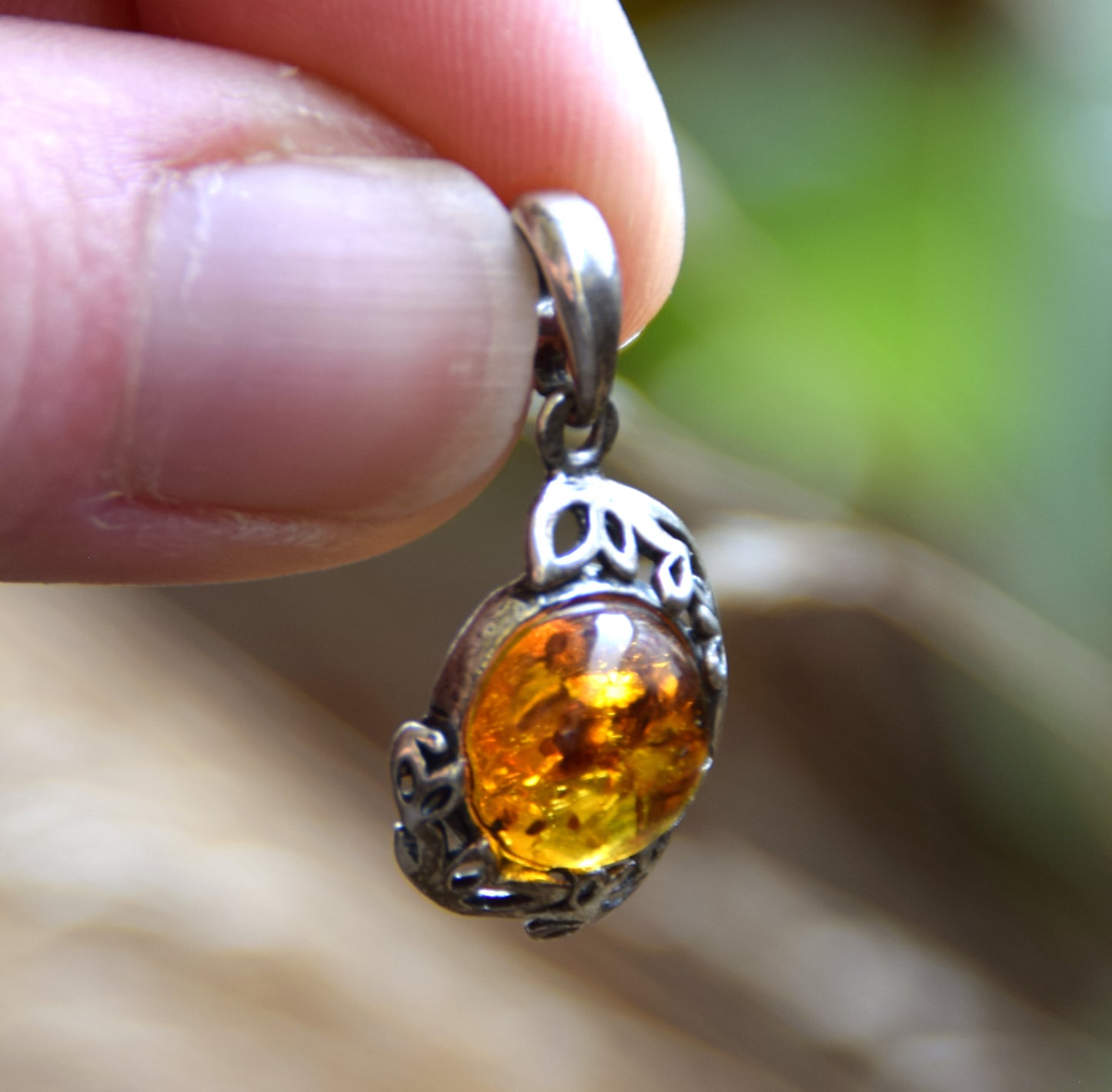 Elegant round pendant with natural cognac amber and 925 sterling silver, MJ Baltica, BW261