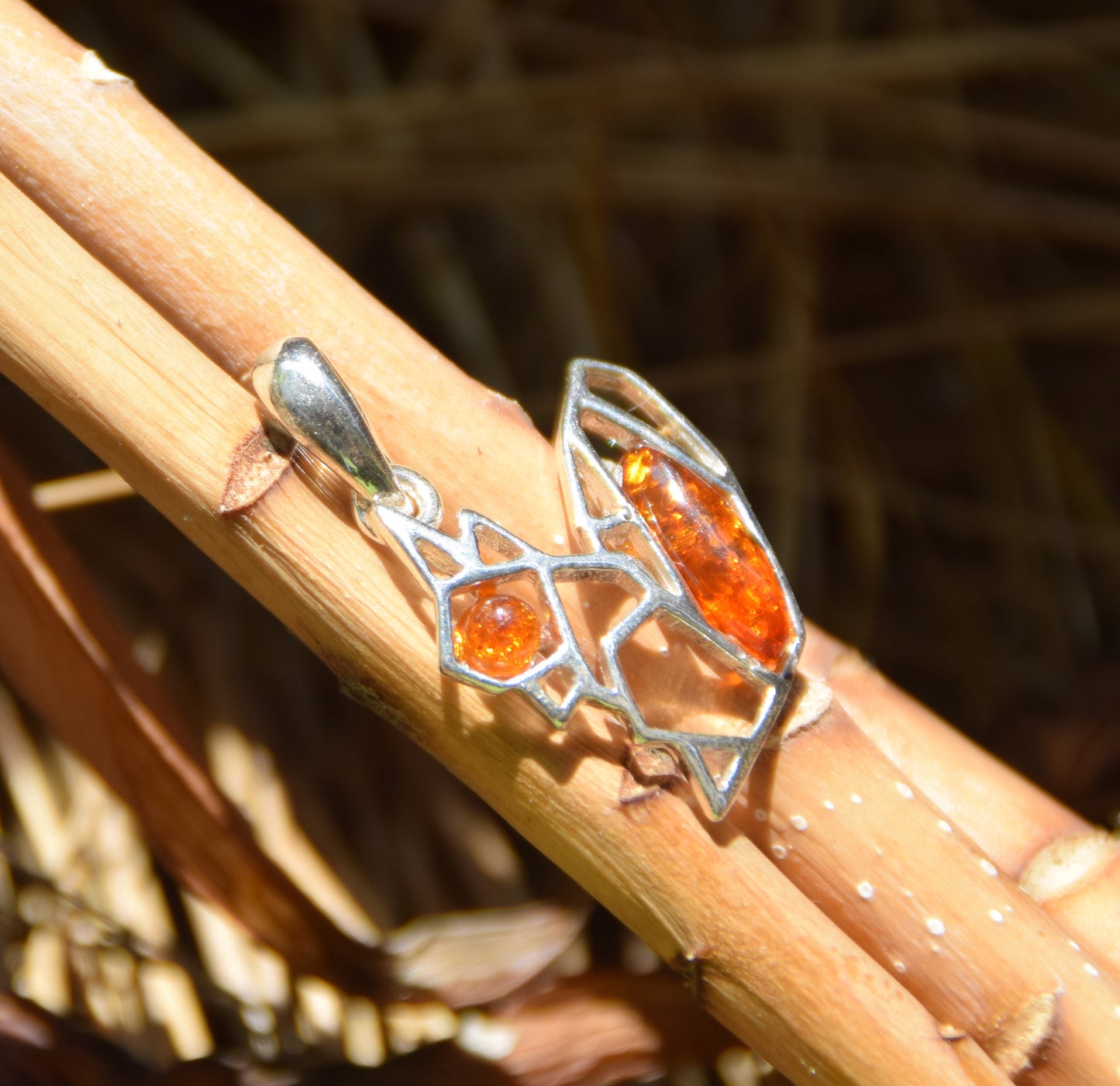 Delicate pendant with small squirrel in natural cognac-colored Amber and 925 Silver, MJ Baltica, BW262