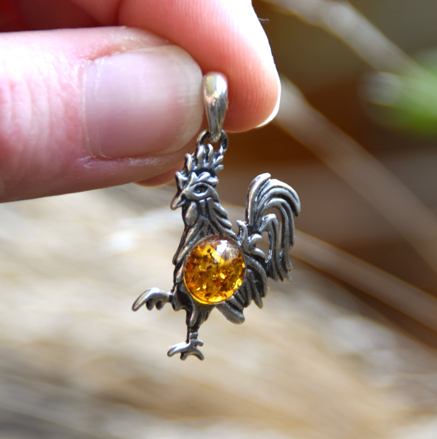 Lucky charm pendant with rooster in cognac-colored natural amber and 925 sterling silver, MJ Baltica, BW273