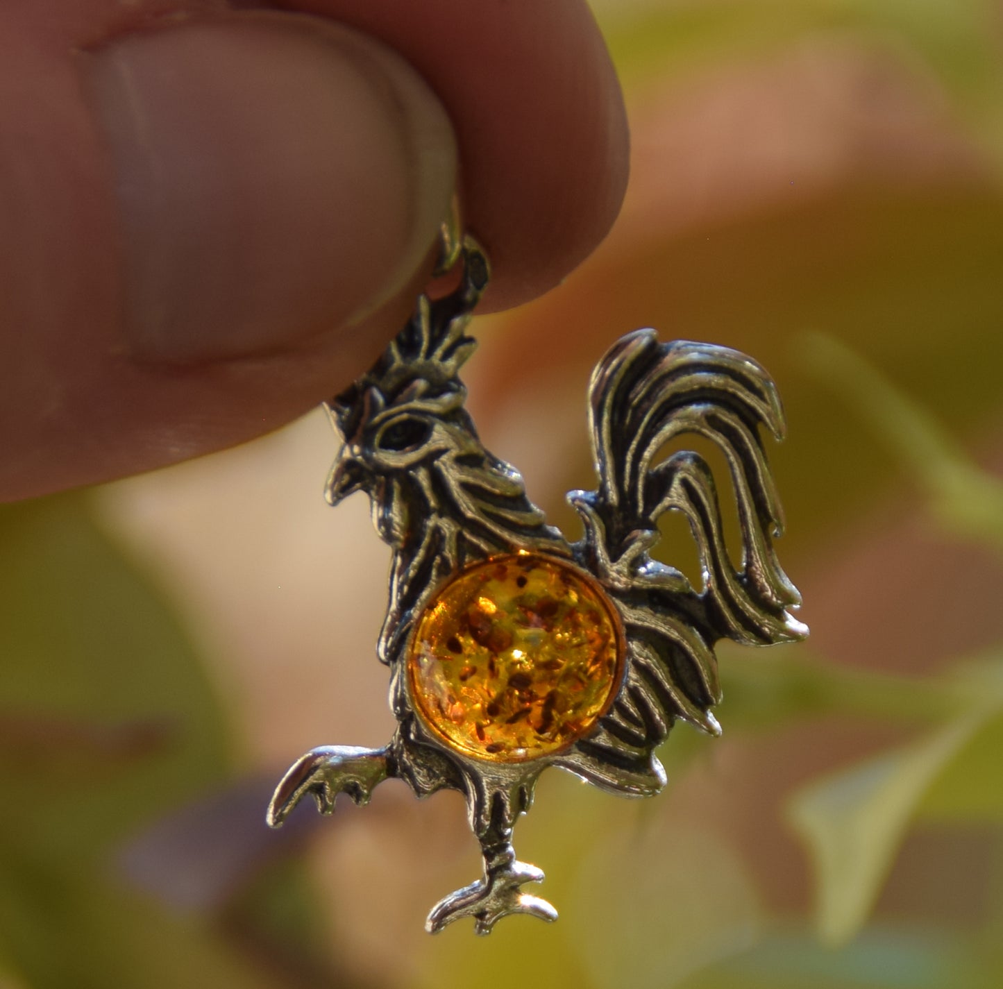 Lucky charm pendant with rooster in cognac-colored natural amber and 925 sterling silver, MJ Baltica, BW273