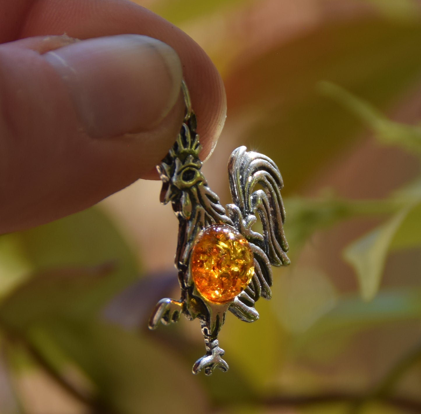 Lucky charm pendant with rooster in cognac-colored natural amber and 925 sterling silver, MJ Baltica, BW273