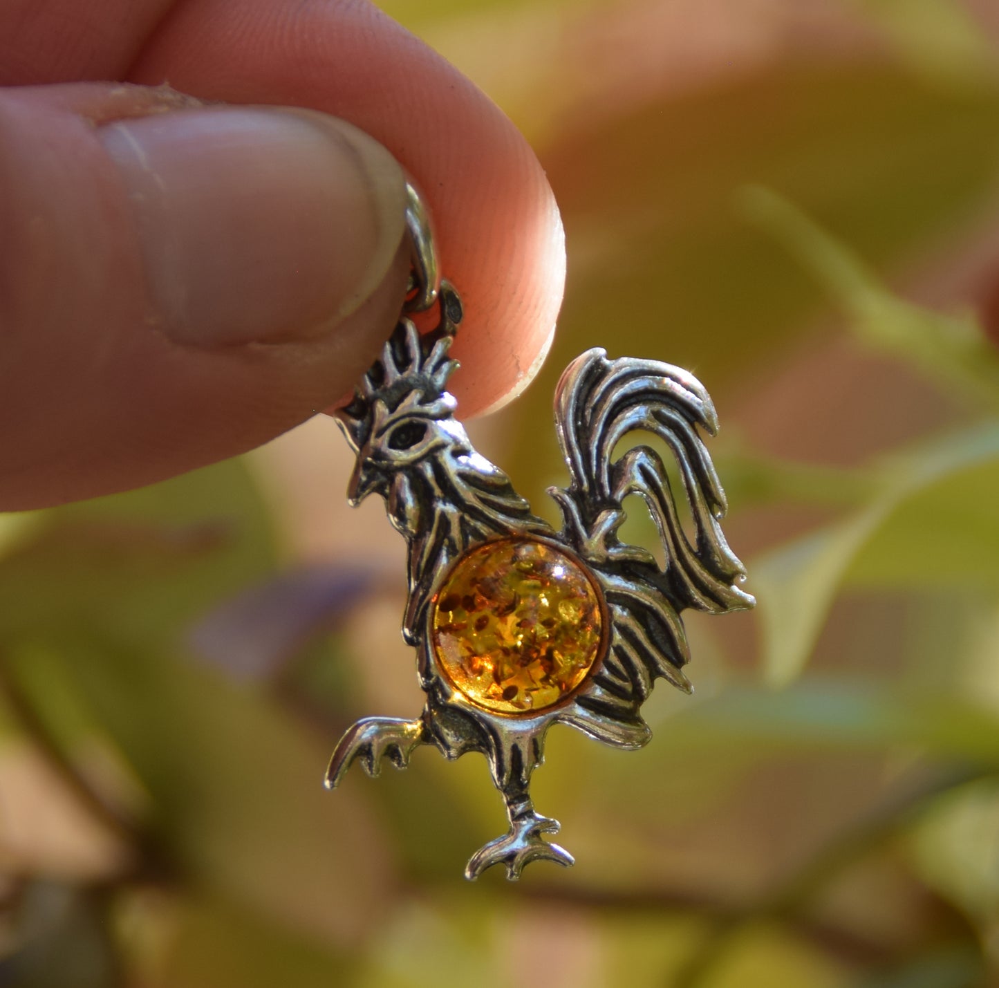 Lucky charm pendant with rooster in cognac-colored natural amber and 925 sterling silver, MJ Baltica, BW273