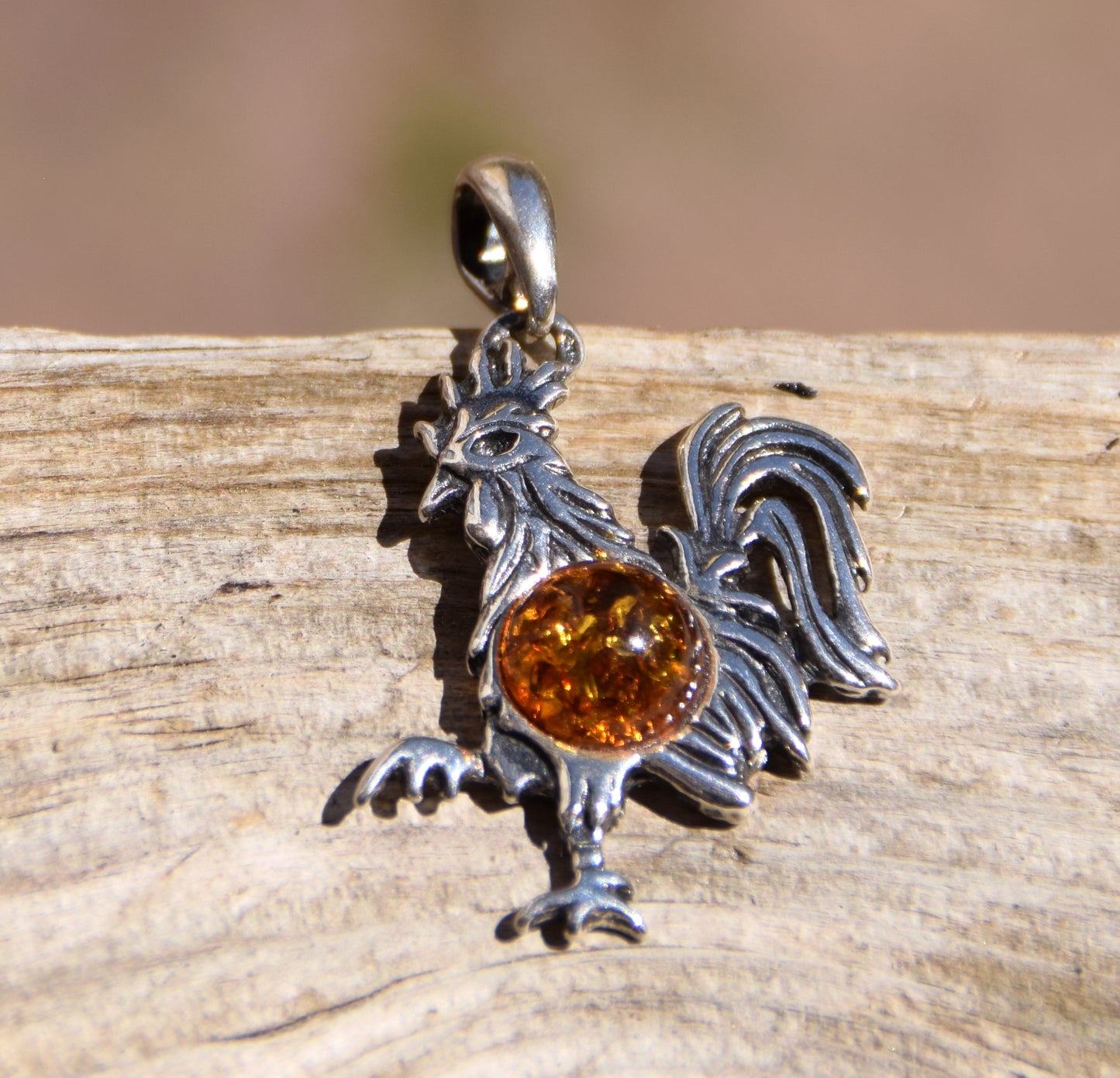 Lucky charm pendant with rooster in cognac-colored natural amber and 925 sterling silver, MJ Baltica, BW273