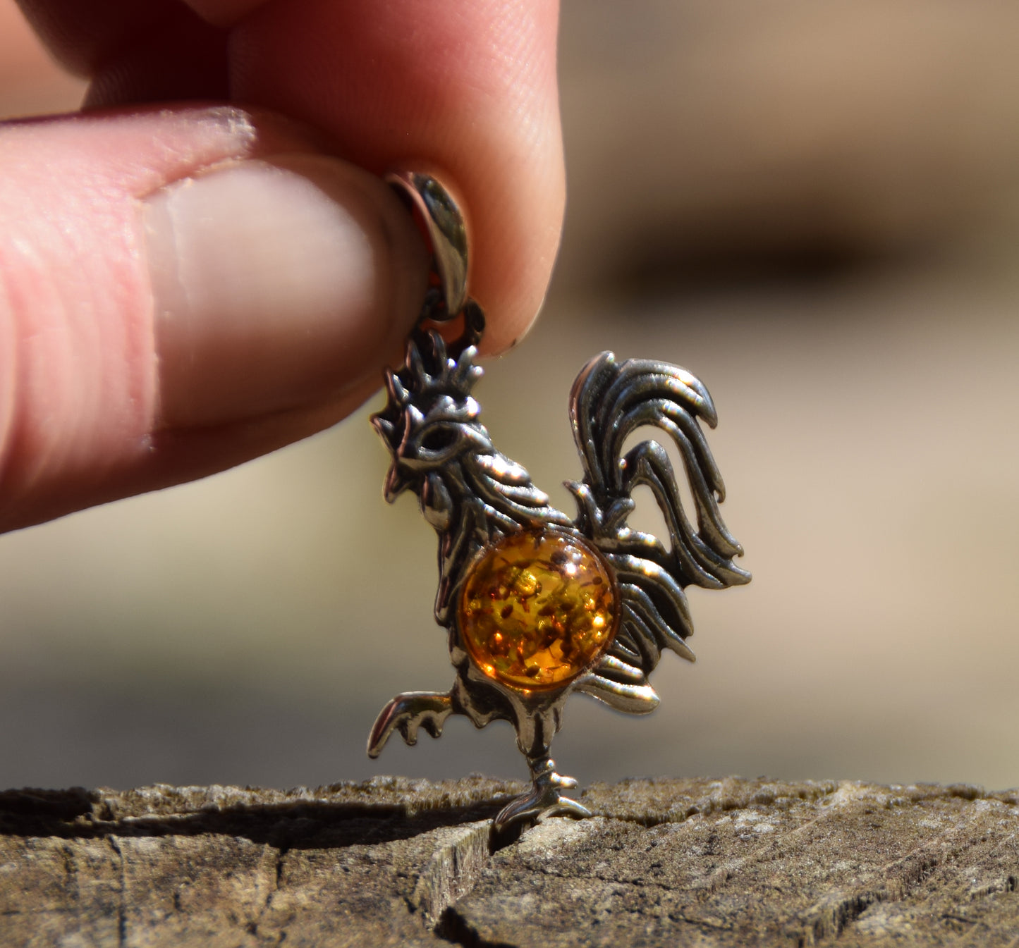Lucky charm pendant with rooster in cognac-colored natural amber and 925 sterling silver, MJ Baltica, BW273