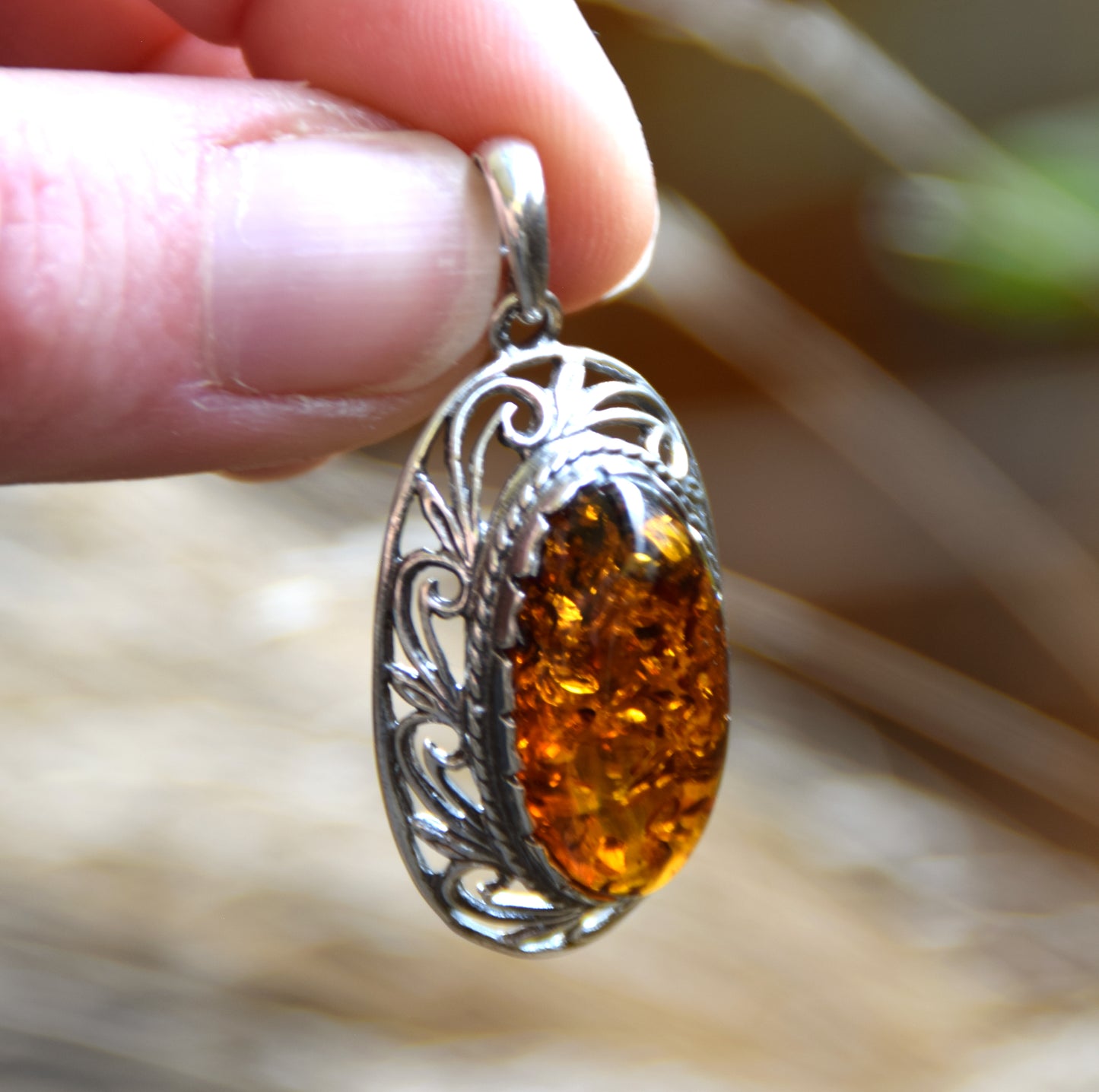 Classic large oval pendant in cognac-colored natural Amber and 925 Silver, MJ Baltica, BW278