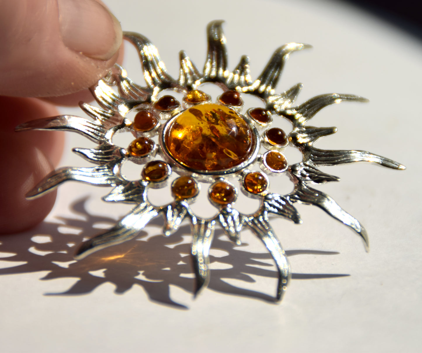Mosaic pendant with a brilliant ray sun in natural Cognac Amber and Sterling Silver 925, MJ Baltica, BW280