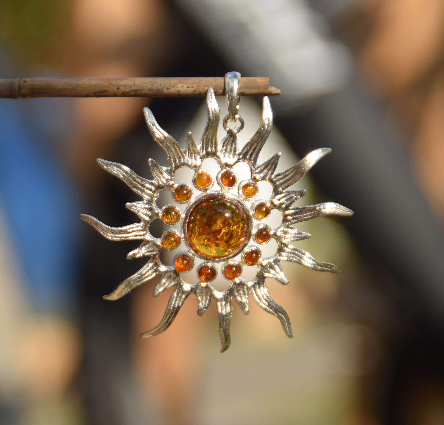 Mosaic pendant with a brilliant ray sun in natural Cognac Amber and Sterling Silver 925, MJ Baltica, BW280