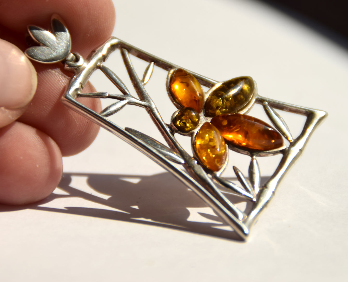 Large pendant with a floral composition in natural Amber of various shades and Sterling Silver 925, MJ Baltica, BW286