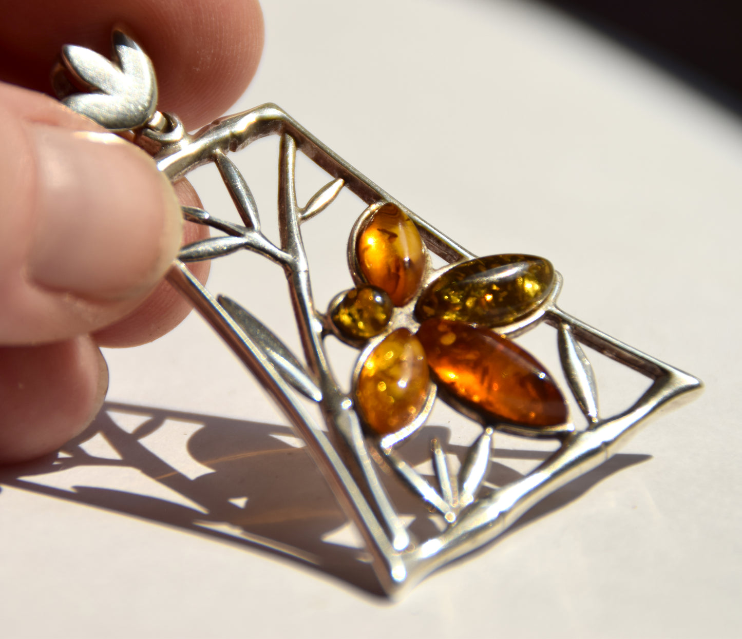 Large pendant with a floral composition in natural Amber of various shades and Sterling Silver 925, MJ Baltica, BW286