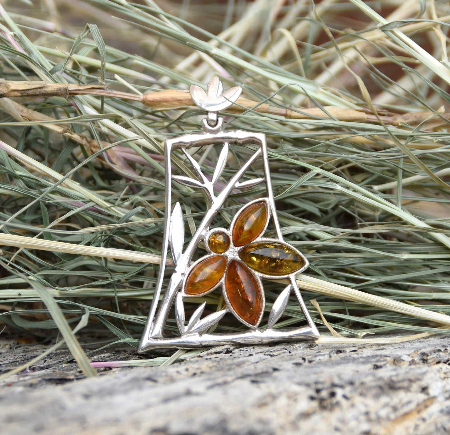 Large pendant with a floral composition in natural Amber of various shades and Sterling Silver 925, MJ Baltica, BW286