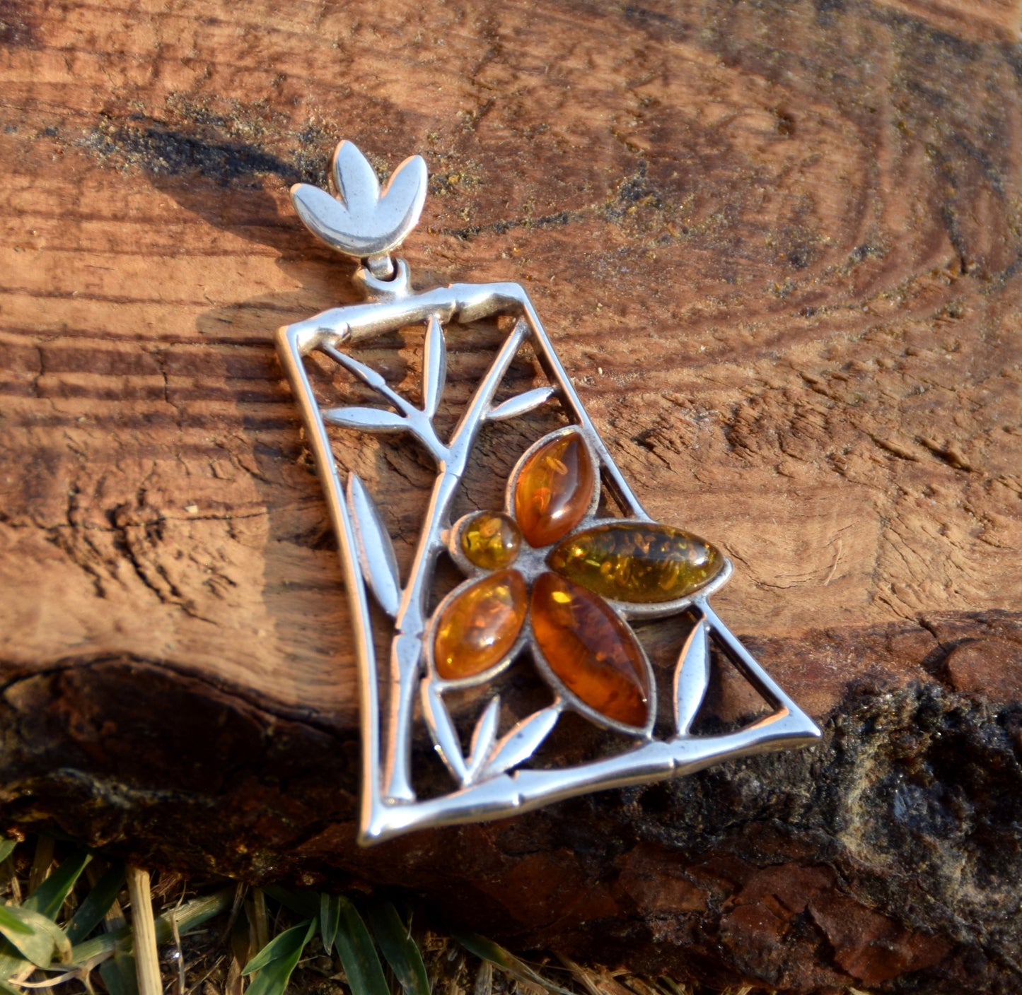 Large pendant with a floral composition in natural Amber of various shades and Sterling Silver 925, MJ Baltica, BW286