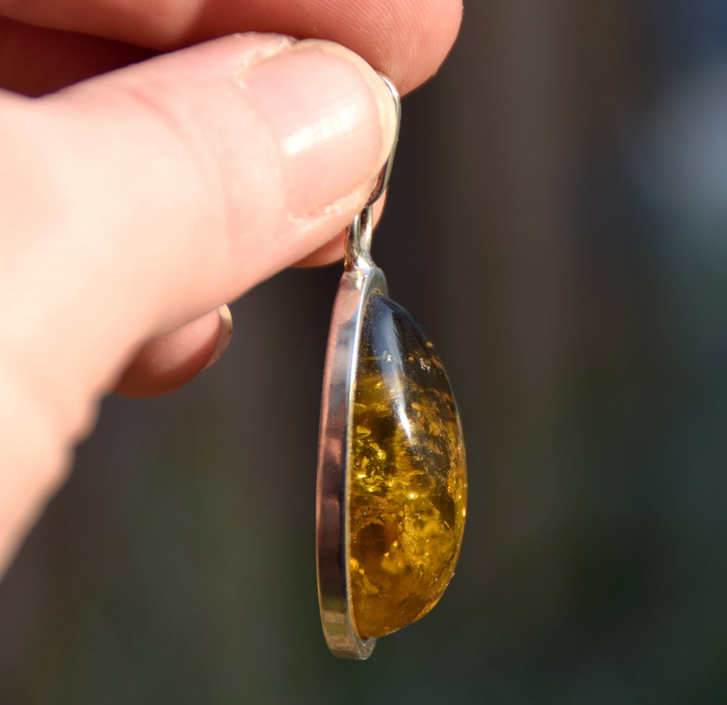 Large oval pendant with natural green amber and 925 silver, MJ Baltica, BW289