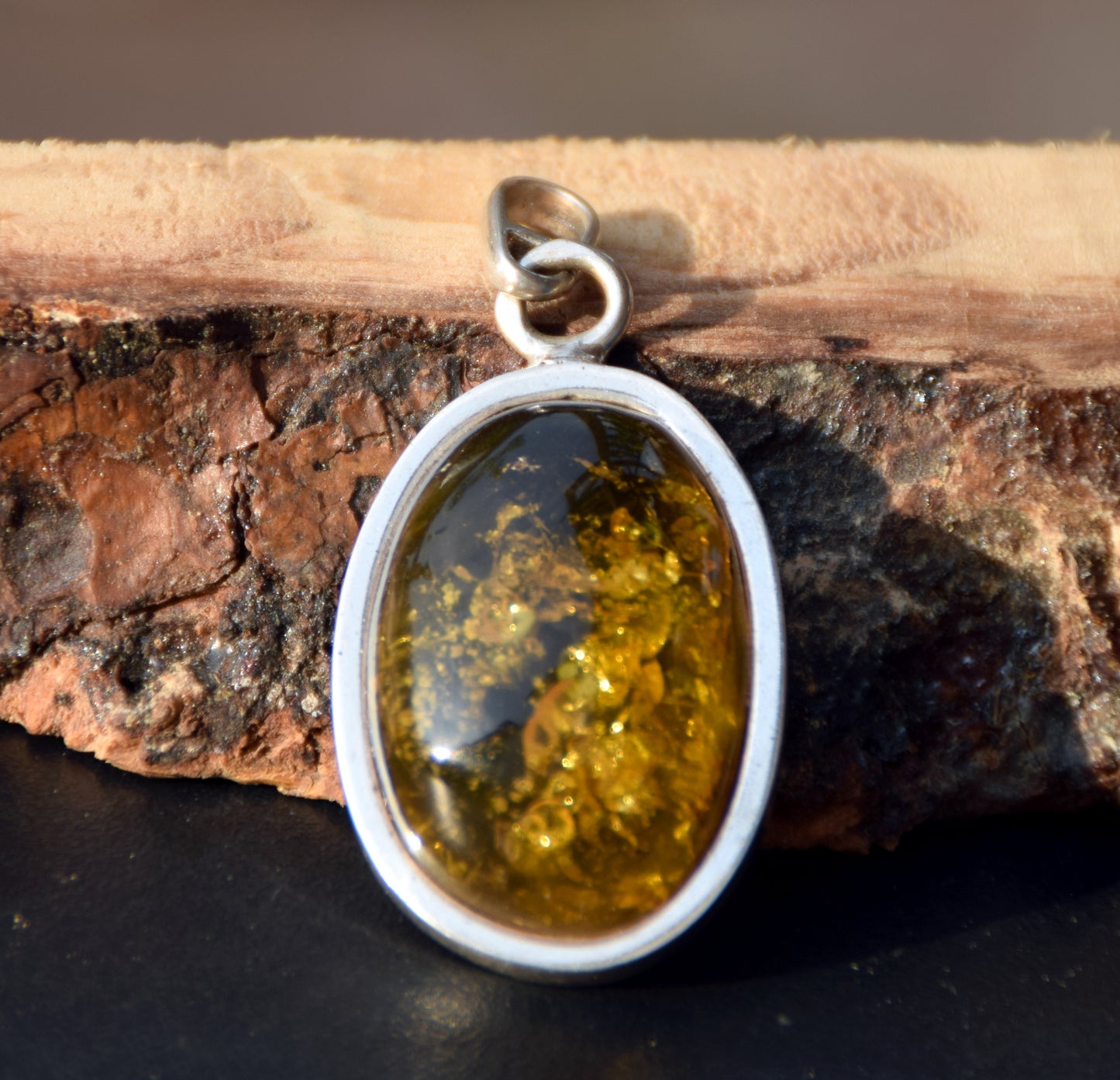 Large oval pendant with natural green amber and 925 silver, MJ Baltica, BW289