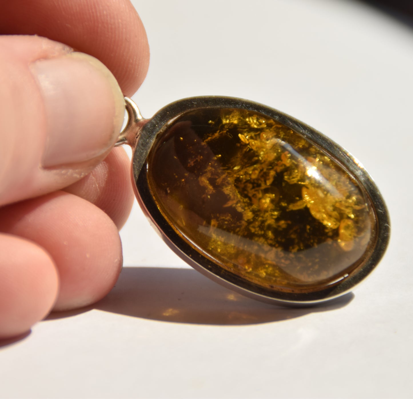 Large oval pendant with natural green amber and 925 silver, MJ Baltica, BW289