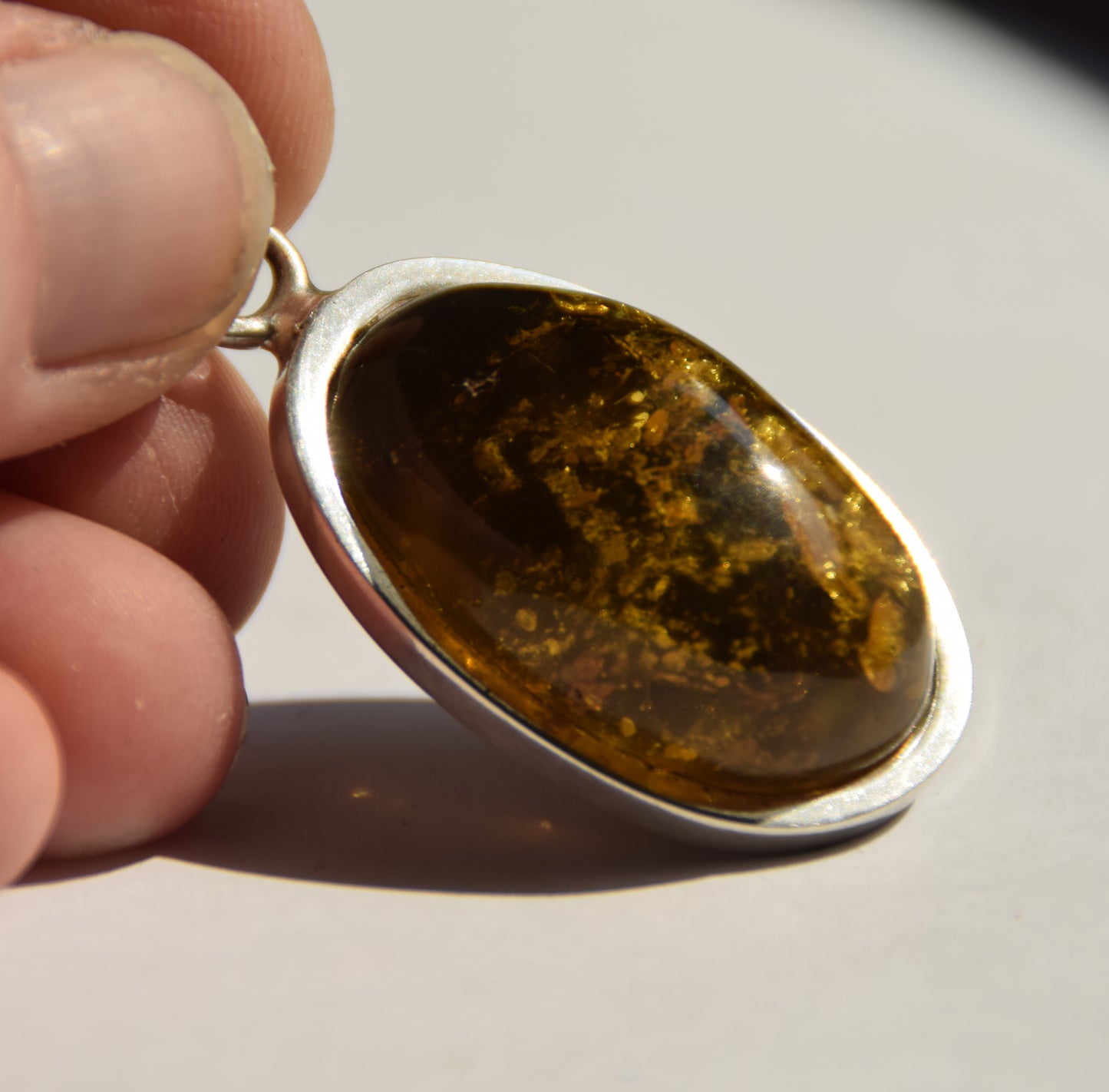 Large oval pendant with natural green amber and 925 silver, MJ Baltica, BW289