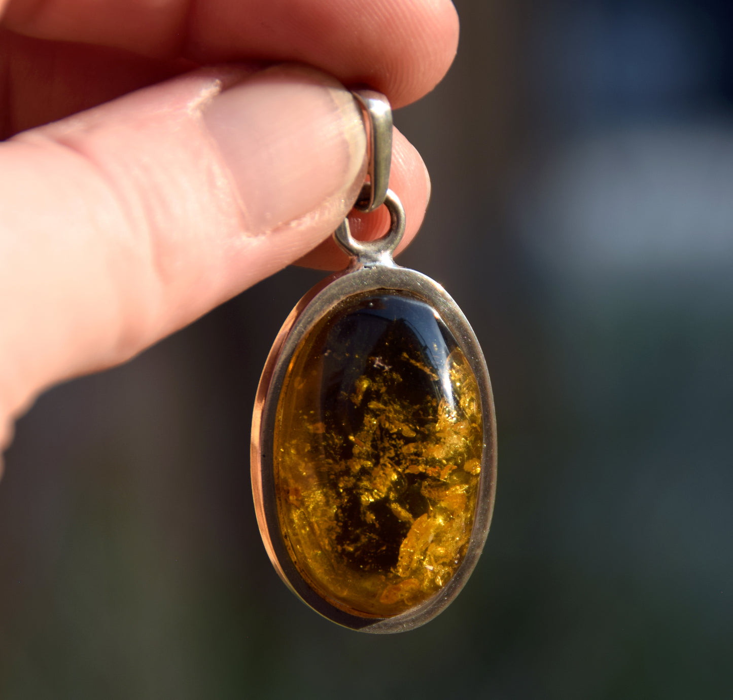 Large oval pendant with natural green amber and 925 silver, MJ Baltica, BW289