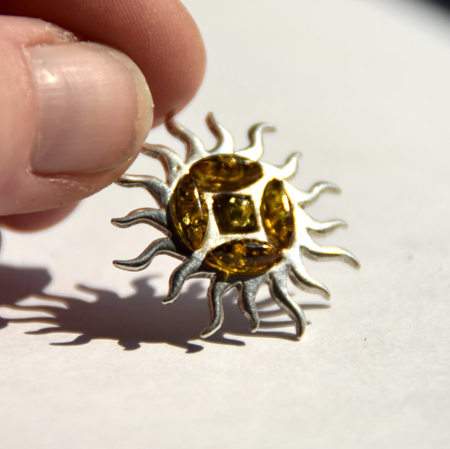 Refined sun-shaped pendant with natural green amber, 925 Silver, MJ Baltica, BW291