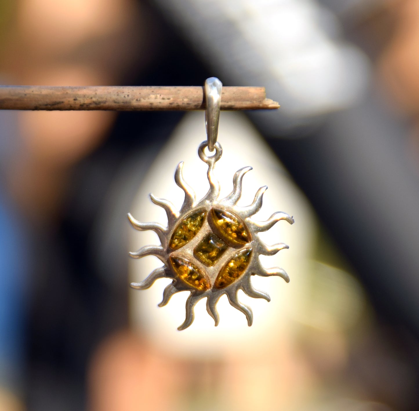 Refined sun-shaped pendant with natural green amber, 925 Silver, MJ Baltica, BW291