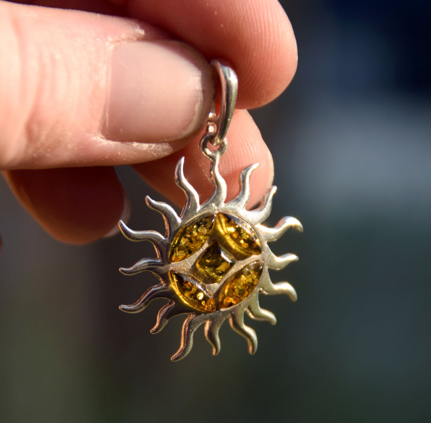 Refined sun-shaped pendant with natural green amber, 925 Silver, MJ Baltica, BW291