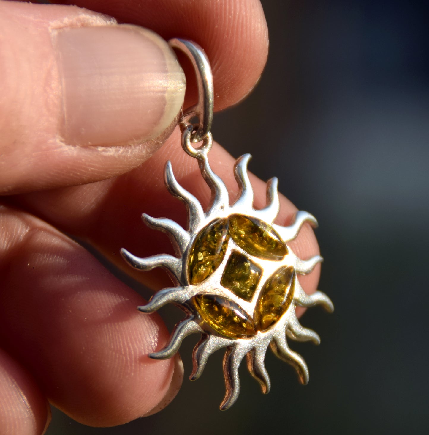 Refined sun-shaped pendant with natural green amber, 925 Silver, MJ Baltica, BW291
