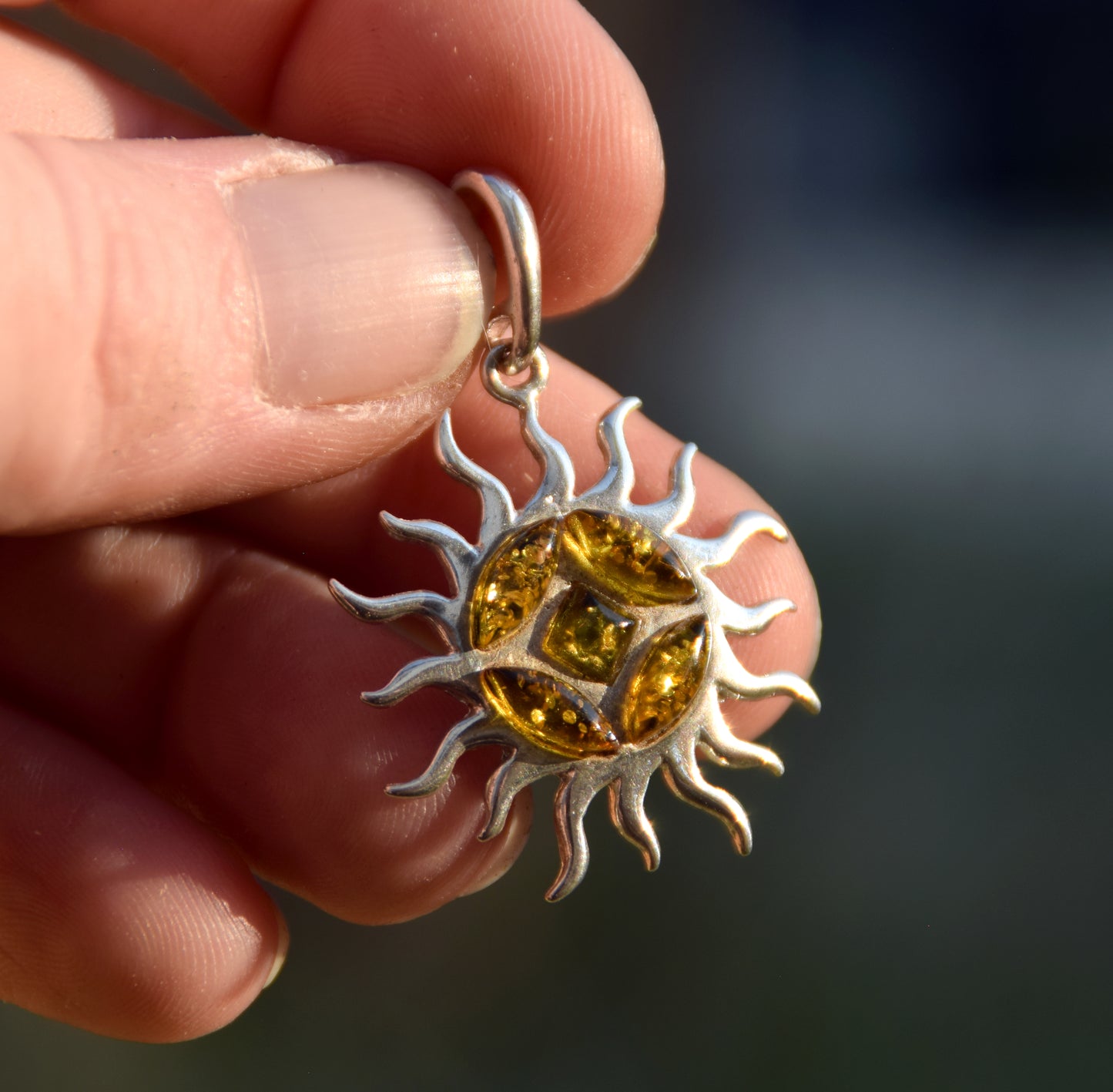 Refined sun-shaped pendant with natural green amber, 925 Silver, MJ Baltica, BW291
