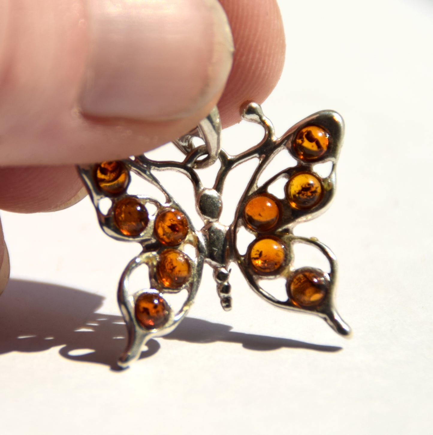 Lightweight pendant with butterfly in natural cognac amber and 925 Sterling Silver, MJ Baltica, BW292