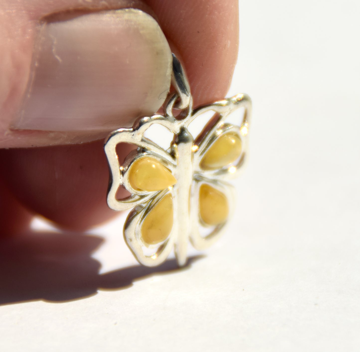 Light butterfly pendant in imperial natural amber and 925 Silver, MJ Baltica, BW294