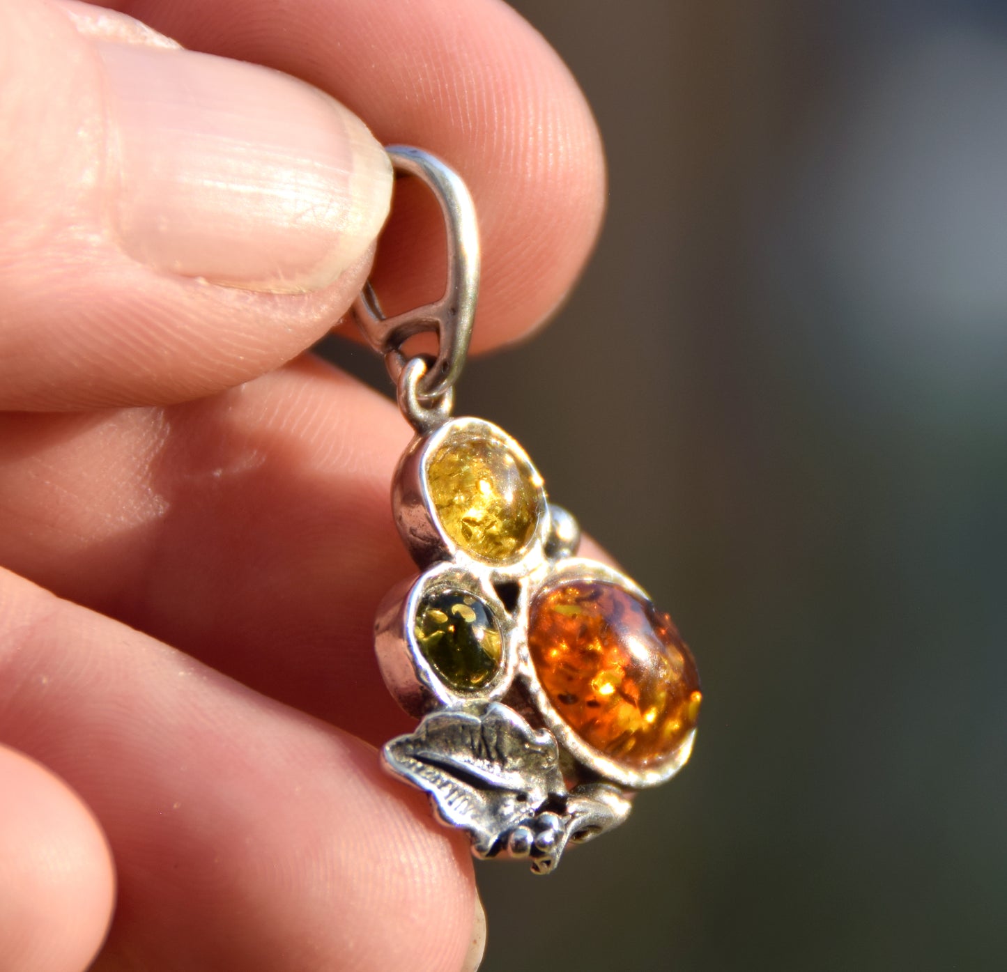 Elegant vintage style pendant in natural Amber of various shades and 925 Silver, MJ Baltica, BW295