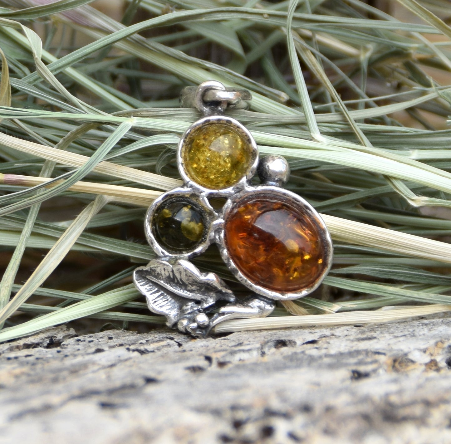 Elegant vintage style pendant in natural Amber of various shades and 925 Silver, MJ Baltica, BW295