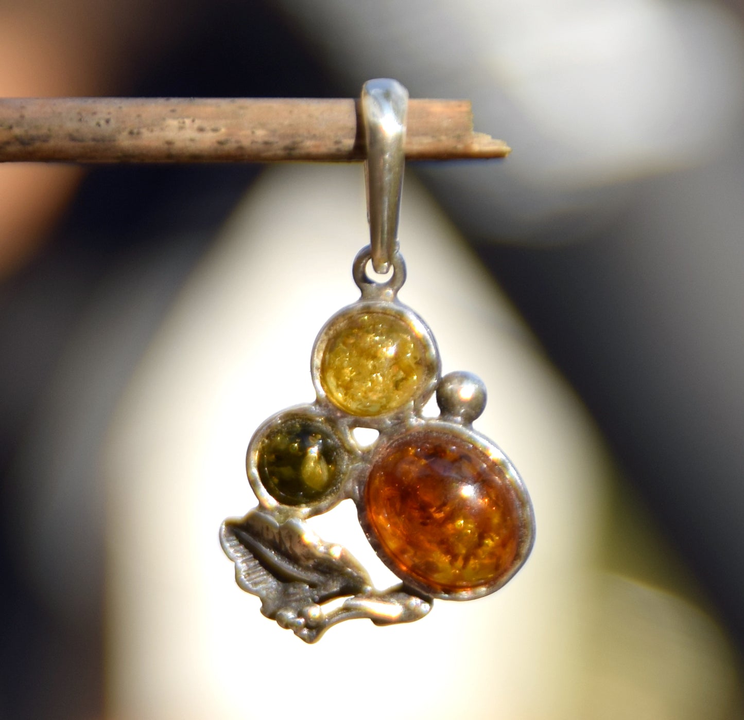 Elegant vintage style pendant in natural Amber of various shades and 925 Silver, MJ Baltica, BW295