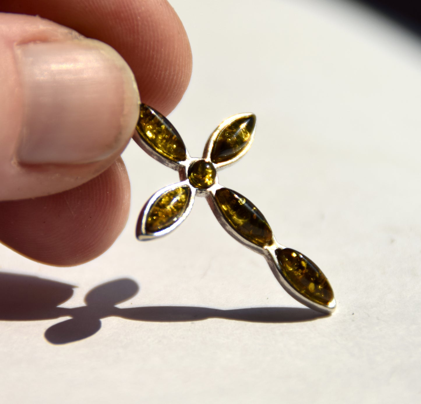 Delicate cross-shaped pendant in natural green Amber and 925 Silver, MJ Baltica, BW297