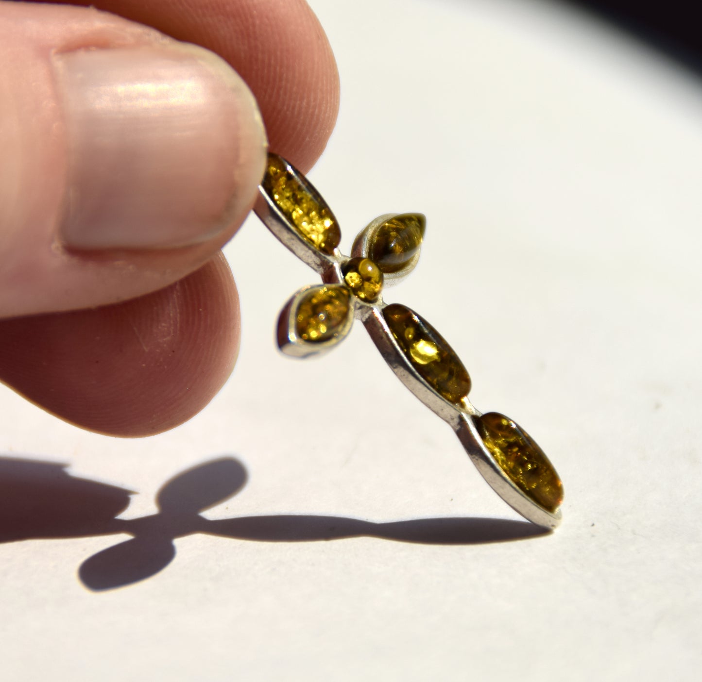 Delicate cross-shaped pendant in natural green Amber and 925 Silver, MJ Baltica, BW297