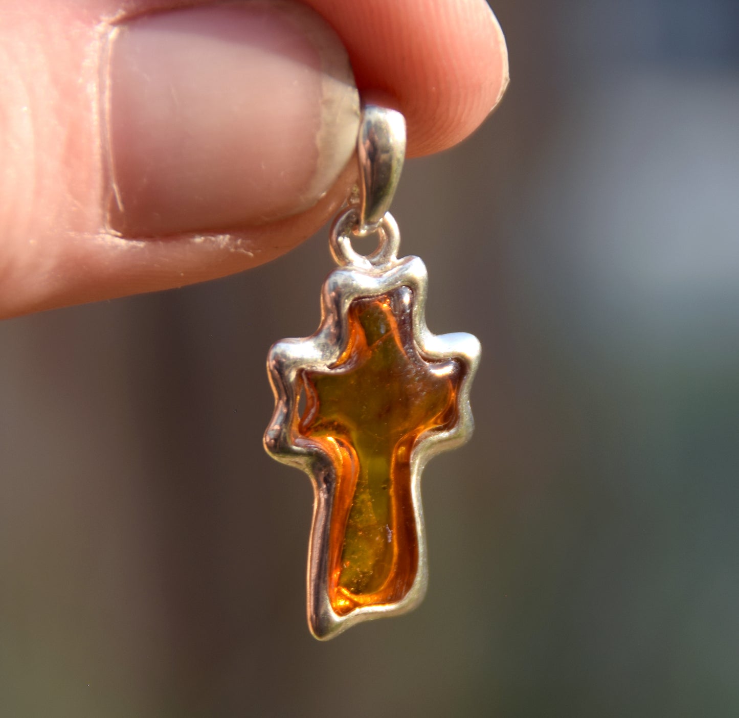Cognac-colored natural Amber and 925 Sterling Silver carved cross pendant, MJ Baltica, BW298