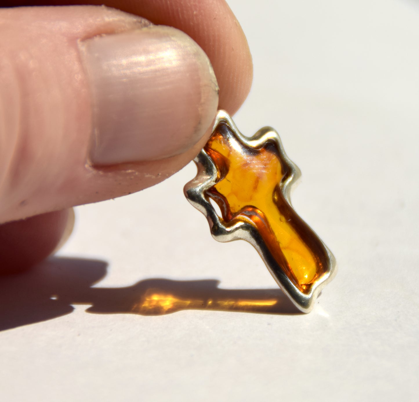 Cognac-colored natural Amber and 925 Sterling Silver carved cross pendant, MJ Baltica, BW298