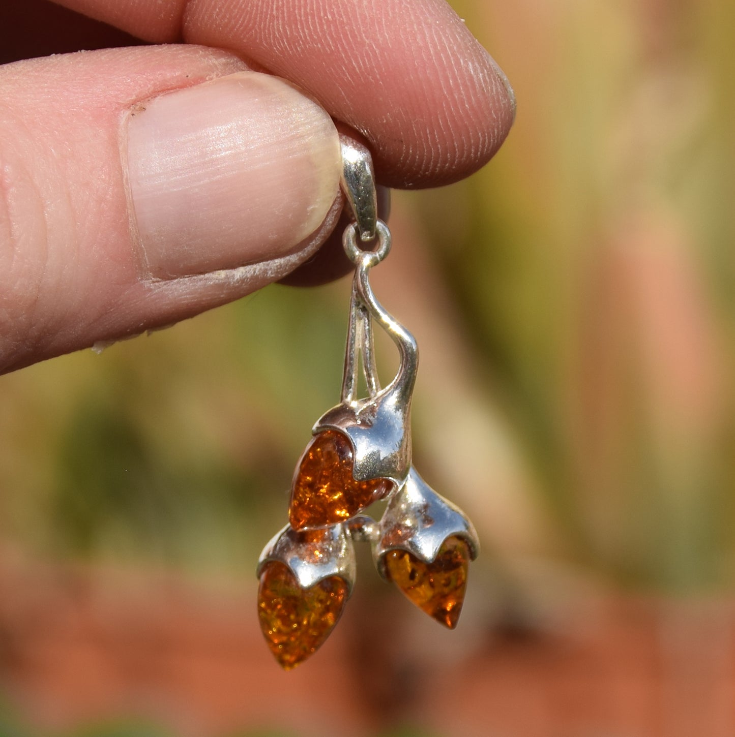 Bright pendant with a branch and natural cognac amber leaves in 925 Silver, MJ Baltica, BW308
