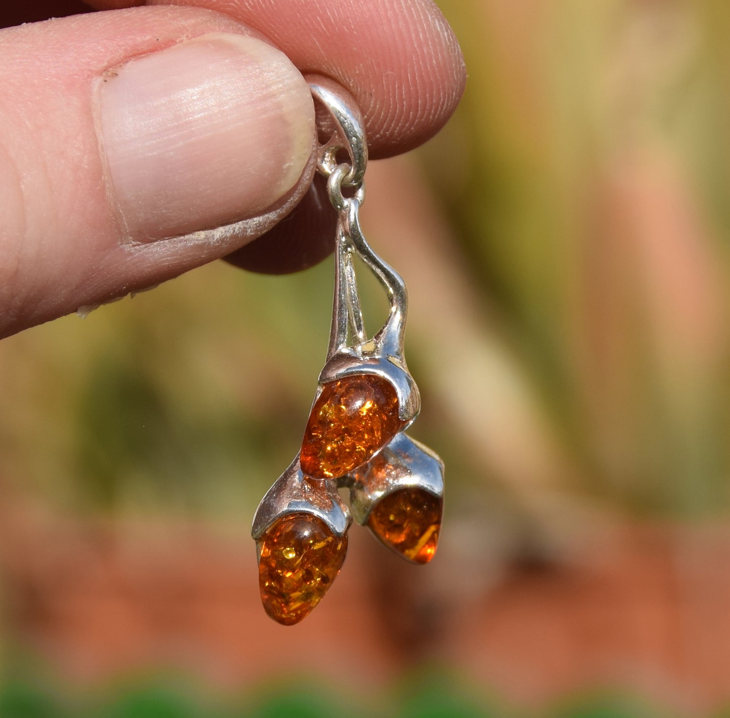 Bright pendant with a branch and natural cognac amber leaves in 925 Silver, MJ Baltica, BW308